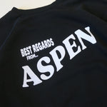 Black sweatshirt with 'Best Regards from Aspen' text on a beige background